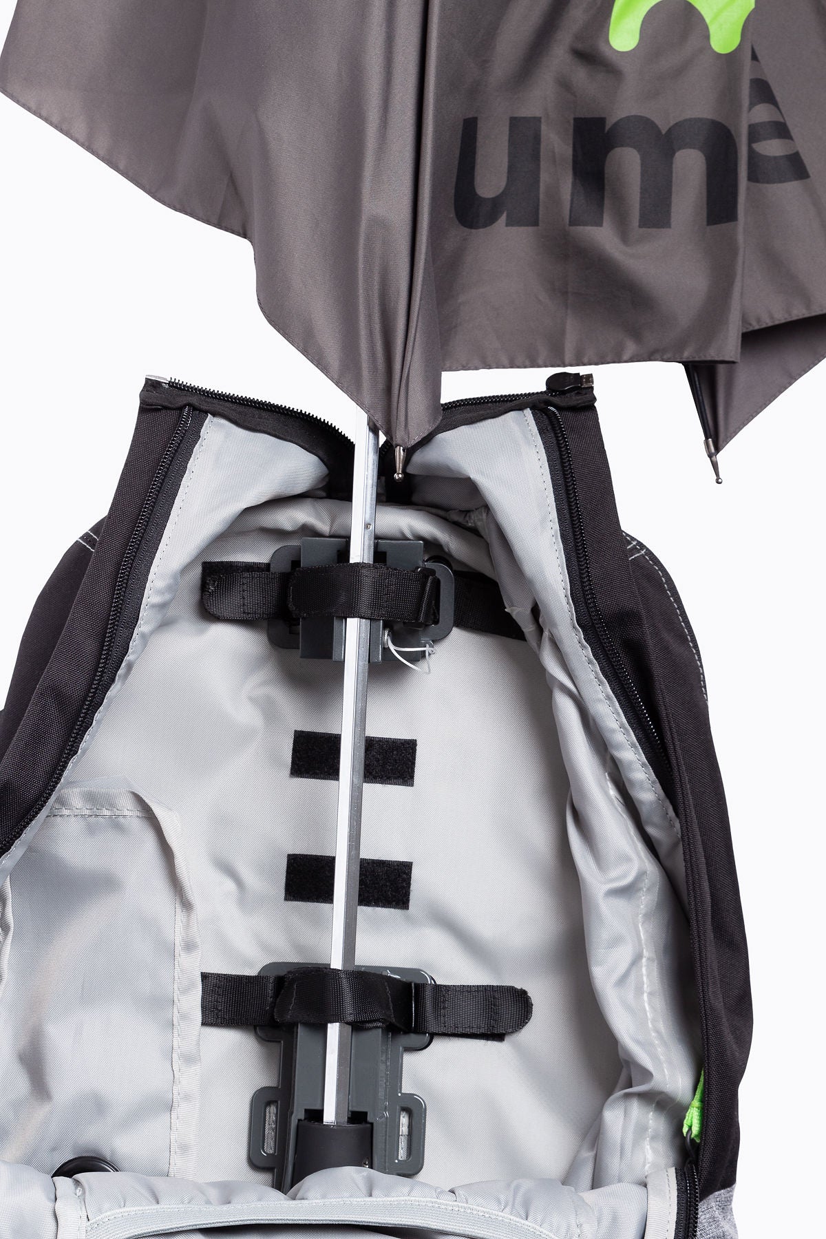 Umbre Excursion Backpack product image, grey with black and green highlights , showing internal bracket that umbrella attaches too.